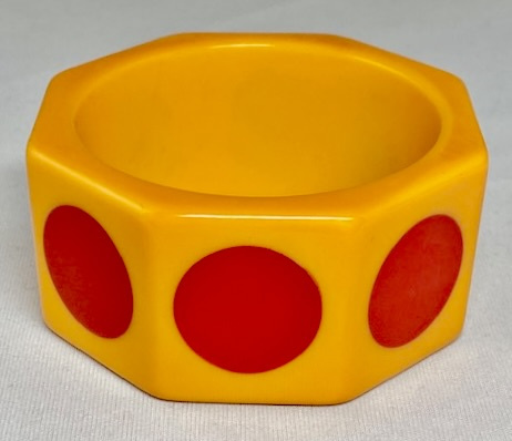 BB136 wide octagon marigold/large red dots bakelite bangle